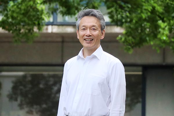 佐野 英二